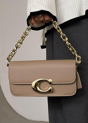 Жіноча сумка — клатч coach коуч у кольорах беж, крос-боді