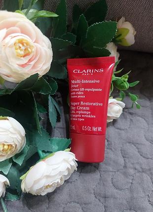 Clarins super restorative - дневной крем для всех
типов кожи, миниатюра, 15 мл;
