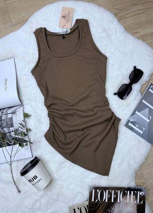 Жіноча базова асиметрична майка в рубчик