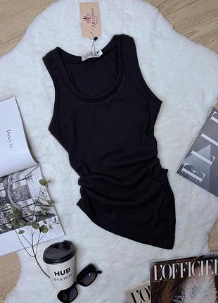 Жіноча базова асиметрична майка в рубчик