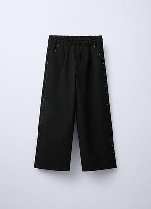 Брюки на дівчинку