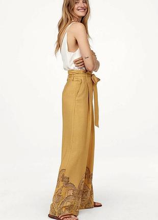Брюки палаццо горчичные с принтом,