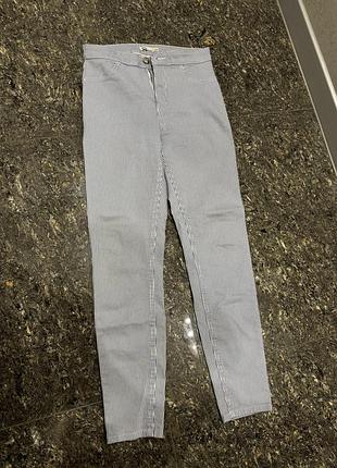 Жіночі джинси в смужку