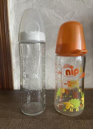 Бутылочки белая фирмы nuk, оранжевая фирма nip