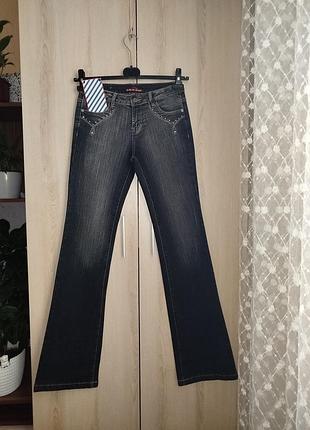 Джинси 28 р. пот - 36,5 см. поб - 42 см.