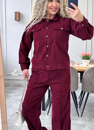Жіночий одяг, брючний костюм на кнопках