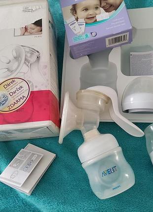 Ручной молокоотсос avent + пакеты для молока+ бутылочка