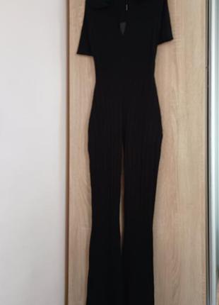 Роскошный женский черный комбинезон в рубчик