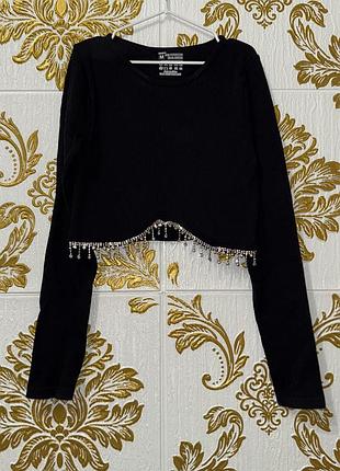 Черный топ в рубрик с бахромой из страз