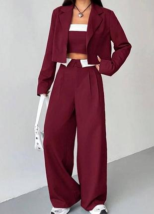 Жіночий брючний костюм у бордовому кольорі якісного матеріалу