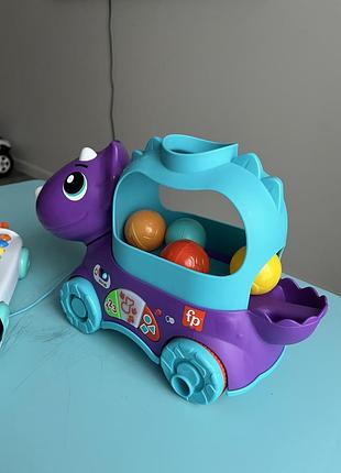 Іграшка fisher price та панда