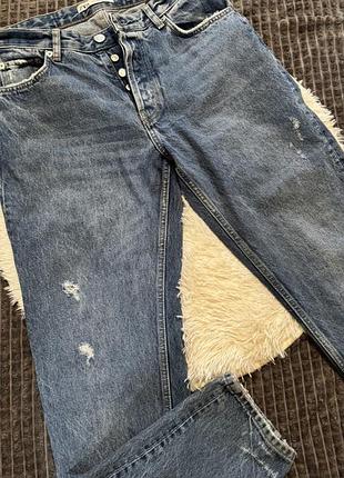 Джинси з потертостями