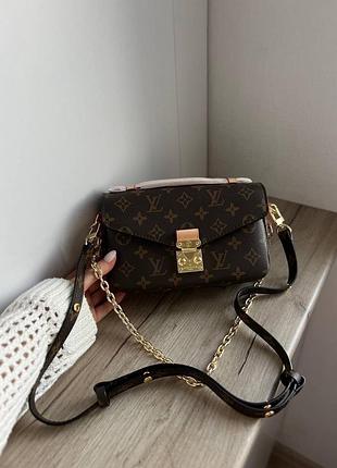 Lv pochette metis revers