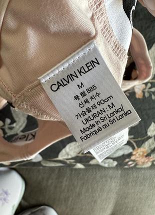 Бюстгальтер топ рожевий calvin klein BDS secret xs s дії5 фото