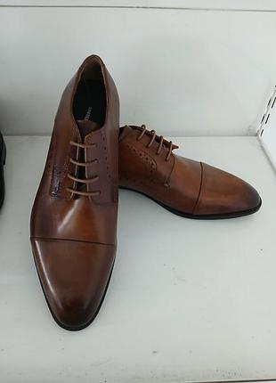 Кожаные туфли.