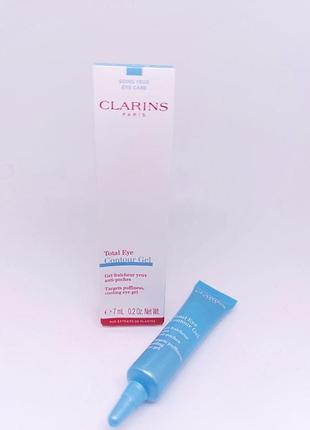 Охолоджувальний гель для усунення слідів втоми навколо очей clarins total eye contour gel1 фото