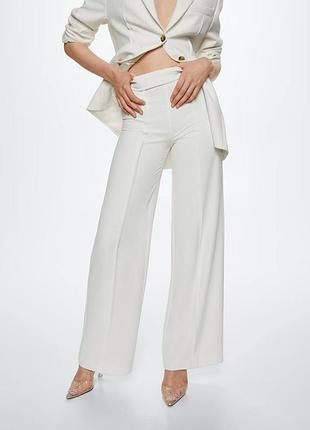 Расклешенные костюмные брюки