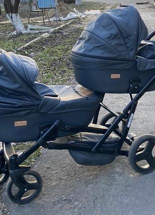 Дитяча коляска для двійнят