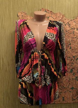 Туника женская с открытой спинкой.