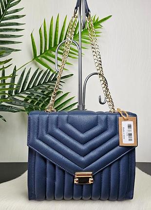 Красивая и стильная кожаная сумка