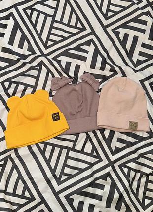 Три шапочки на дівчинку