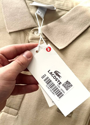 Трендовое поло мужское lacoste original три цвета черный белый бежевый 10