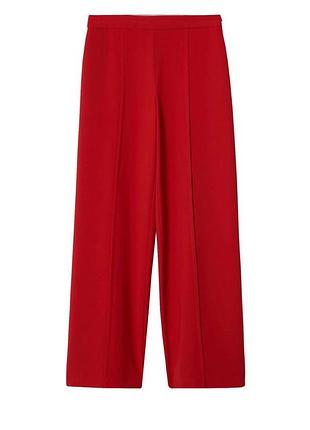 Расклешенные костюмные брюки