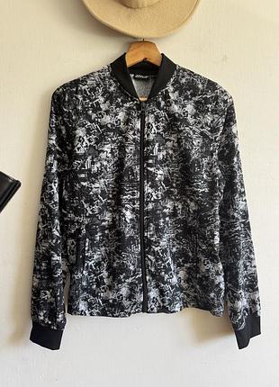 Бігова вітрівка