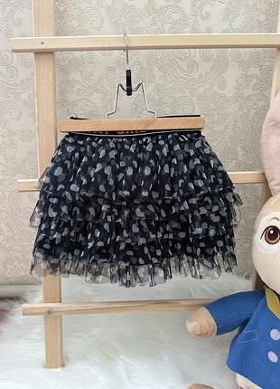 Спідничка з рюшами та яскравим пояском