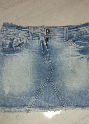 Джинсовая юбочка для девочки 6-9 лет.