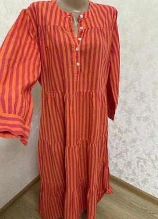Стильна бавовняна ярусна сукня в помаранчеву смужку