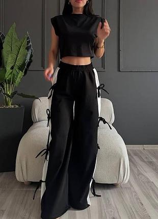 Брюки прямые с лампасом и бантиками 8883