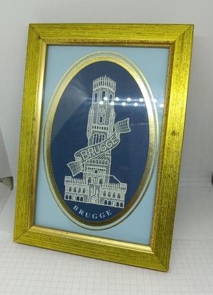 Бельгийское кружево в раме. город боюгге, бельгия.