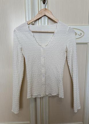 Кофтинка молочно- бежевого кольору на ґудзиках