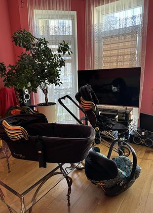 Коляска cybex priam с золотыми крыльями прогулка автокресло и люлька