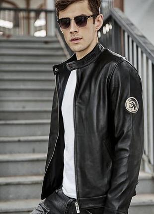 Елегантна шкіряна куртка