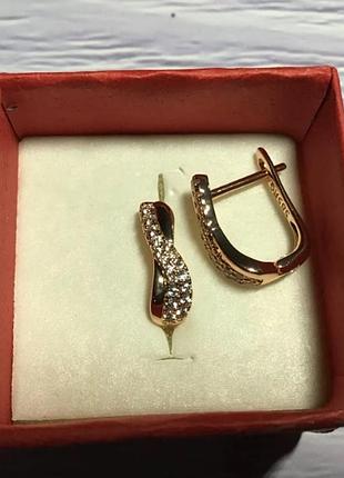 Серьги переплетенные колечки 585 rg штамп золота