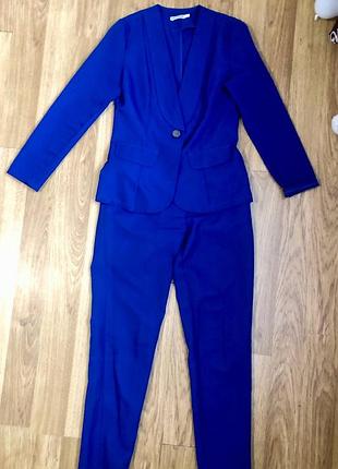Синій брючний костюм , розмір s-m