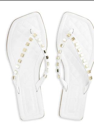 Шльопанці russell&bromley