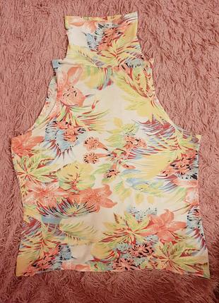 Гольф жіночій барвистий без рукавів