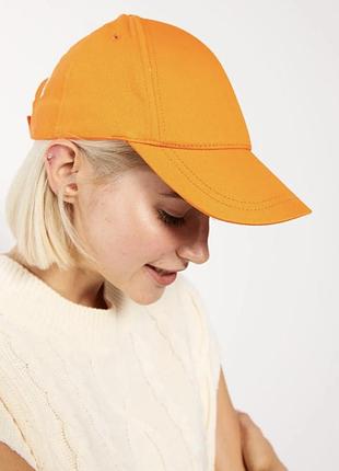 Помаранчева кепка zara