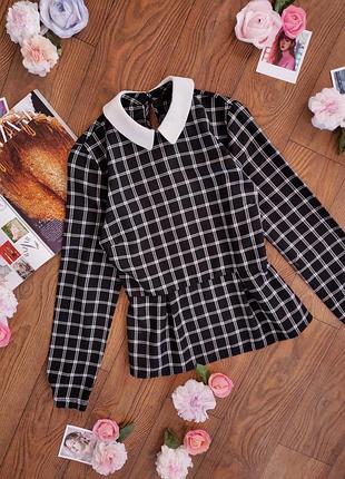 Блуза у клітинку