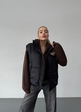 Жіноча жилетка