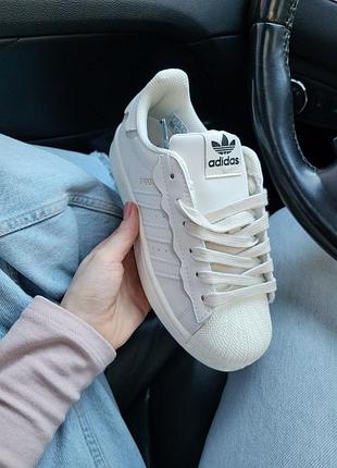 Білі шкіряні кеди adidas