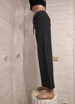 Стильные широкие женские брюки