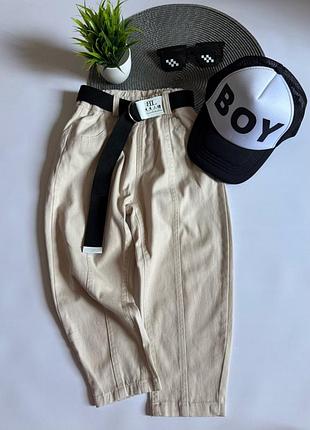 Бежеві штани з ременем