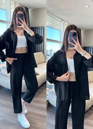 Жіночий чорний весняний костюм двійка з жатки