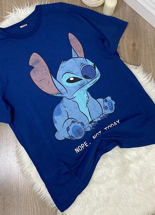 Жіночі синя футболка в діснеєвський принт йде як оверсайз