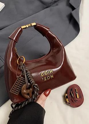 Сумка жіноча лакована кольору бургунді