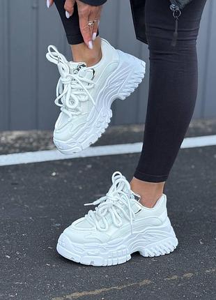 Кросівки білі